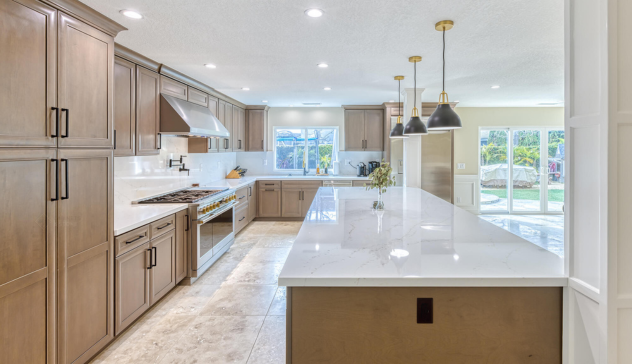 Brighten your kitchen with light-colored cabinets and countertops to reflect natural light and make the space feel larger and more open.